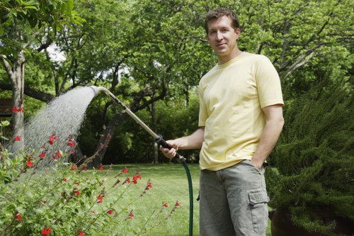 Hardscaping features including walkways and retaining walls in Putney garden